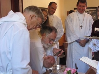 A baptism before Sunday service at St. Andrew's Anglican Church